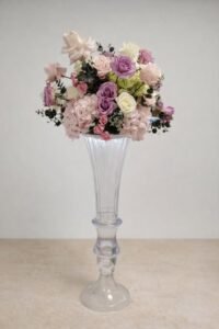 Salle mariage lumières tamisées et fleurs